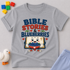 Bible Stories and Blueberries Christian kids shirt in gray featuring a smiling blueberry reading a Bible
