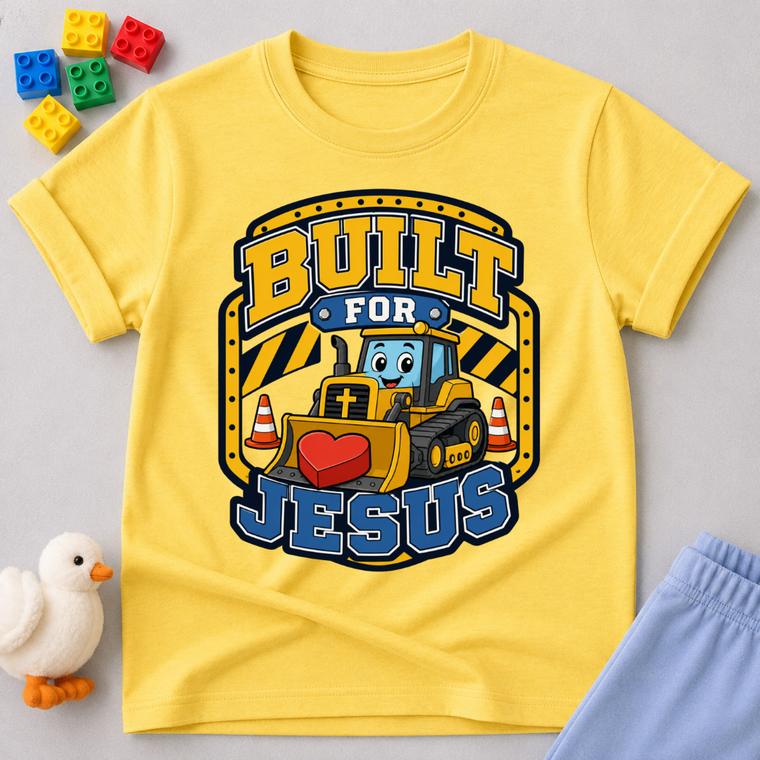 Built for Jesus Crew Christian kids shirt in yellow featuring construction equipment and bold lettering
