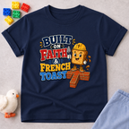 Built on Faith and French Toast Christian kids shirt in navy featuring a smiling French toast character with construction theme
