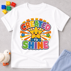Created to Shine Bright Christian kids shirt in white featuring a smiling sunshine and colorful lettering
