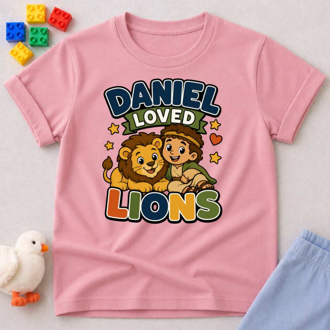 Daniel Loved Lions Christian kids shirt in pink featuring Daniel with smiling lions
