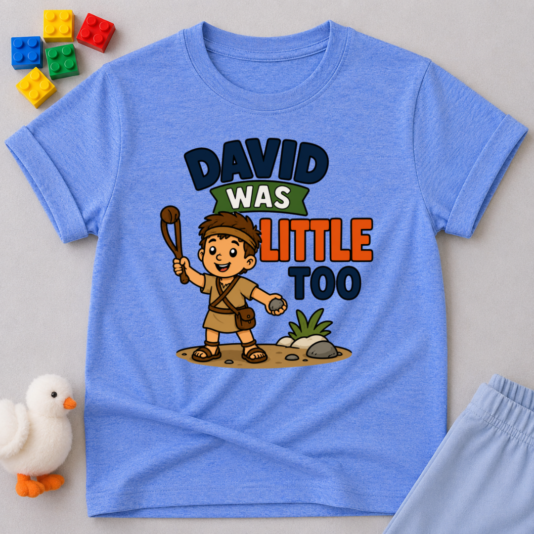 David Was Little Too Christian kids shirt in blue featuring young David holding his sling
