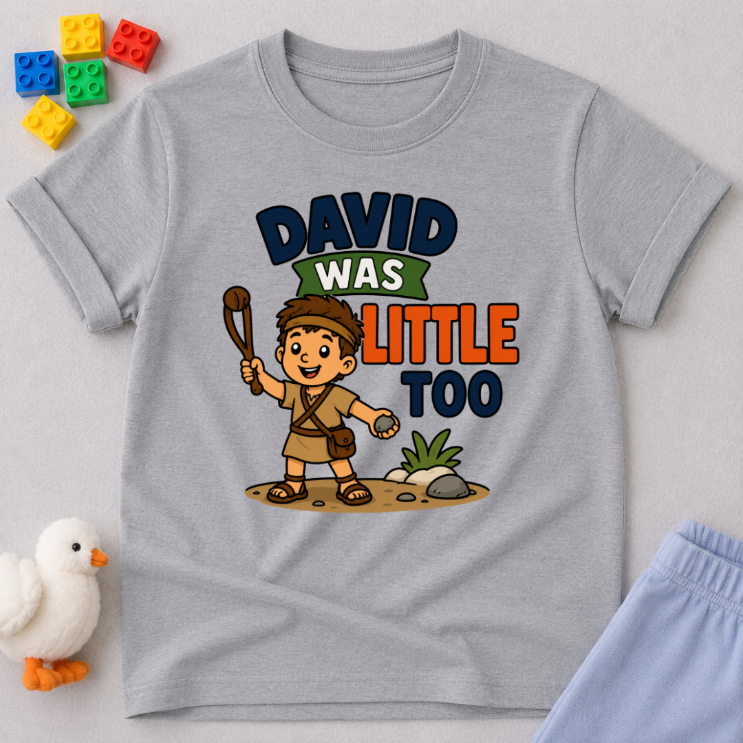 David Was Little Too Christian kids shirt in gray featuring young David holding his sling
