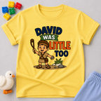 David Was Little Too Christian kids shirt in yellow featuring young David holding his sling
