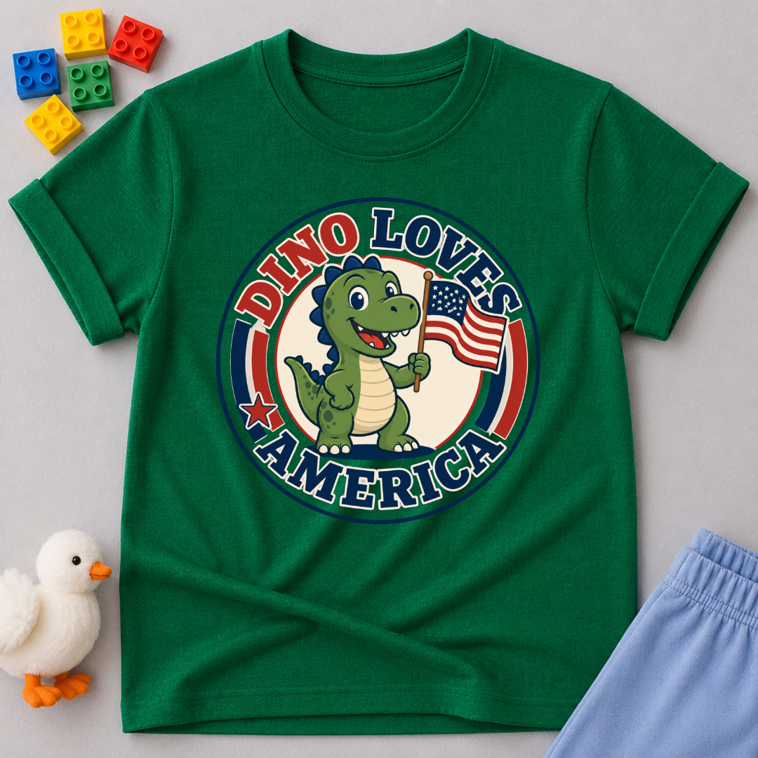 Dino Loves America Shirt Christian kids shirt in green featuring a dinosaur holding an American flag
