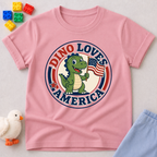 Dino Loves America Shirt Christian kids shirt in  pink featuring a dinosaur holding an American flag
