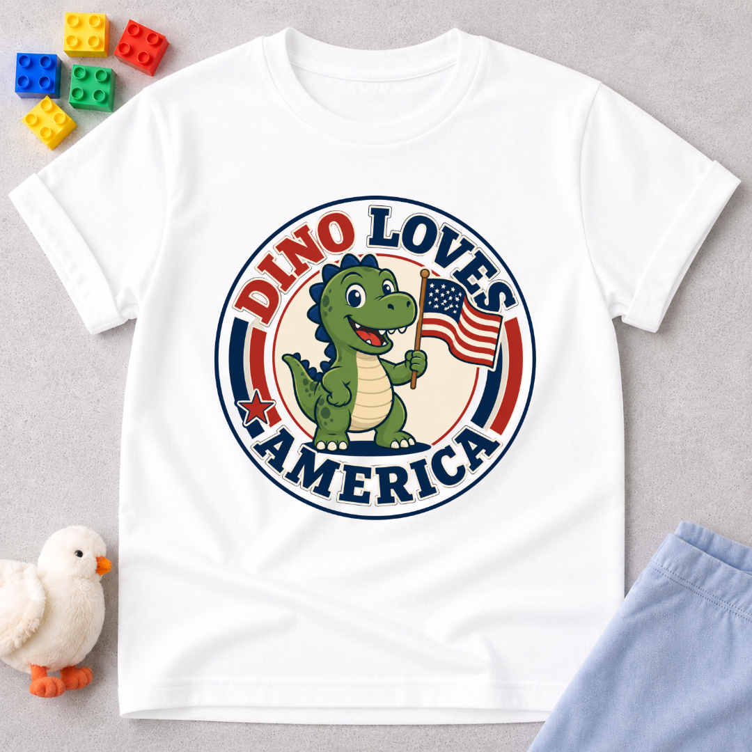 Dino Loves America Shirt Christian kids shirt in white featuring a dinosaur holding an American flag
