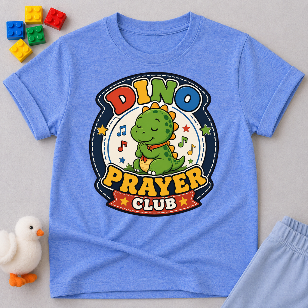 Dino Prayer Club Christian kids shirt in blue featuring a praying dinosaur with colorful lettering
