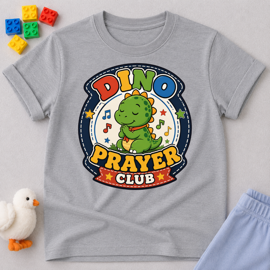 Dino Prayer Club Christian kids shirt in gray featuring a praying dinosaur with colorful lettering

