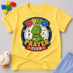 Dino Prayer Club Christian kids shirt in yellow featuring a praying dinosaur with colorful lettering
