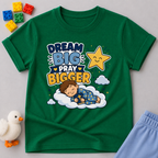 Dream Big Pray Bigger Christian kids shirt in green featuring a sleeping child and star
