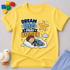 Dream Big Pray Bigger Christian kids shirt in yellow featuring a sleeping child and star
