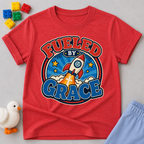 Fueled by Grace Rocket Christian kids shirt in red featuring a colorful rocket and faith-inspired design
