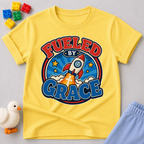 Fueled by Grace Rocket Christian kids shirt in yellow featuring a colorful rocket and faith-inspired design
