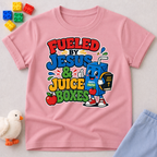 Fueled by Jesus & Juice Boxes Christian kids shirt in pink featuring a smiling juice box with a faith-inspired design
