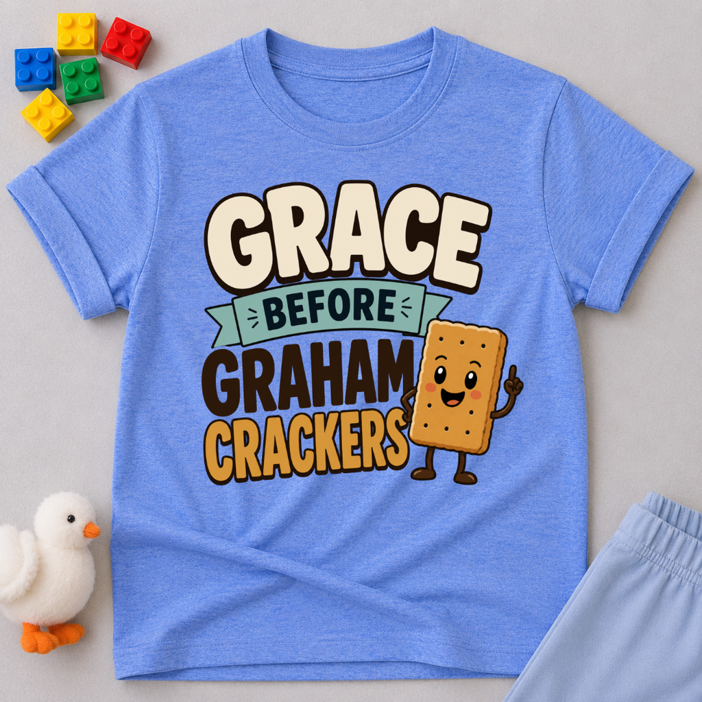 Grace Before Graham Crackers Christian kids shirt in blue featuring a smiling graham cracker
