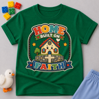 Home Built on Faith Christian kids shirt in green featuring a family home with faith-inspired artwork

