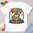 Home Built on Faith Christian kids shirt in white featuring a family home with faith-inspired artwork
