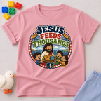 Jesus Feeds Thousands Christian kids shirt in pink featuring Jesus and the miracle of feeding the crowd
