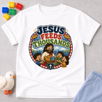 Jesus Feeds Thousands Christian kids shirt in white featuring Jesus and the miracle of feeding the crowd
