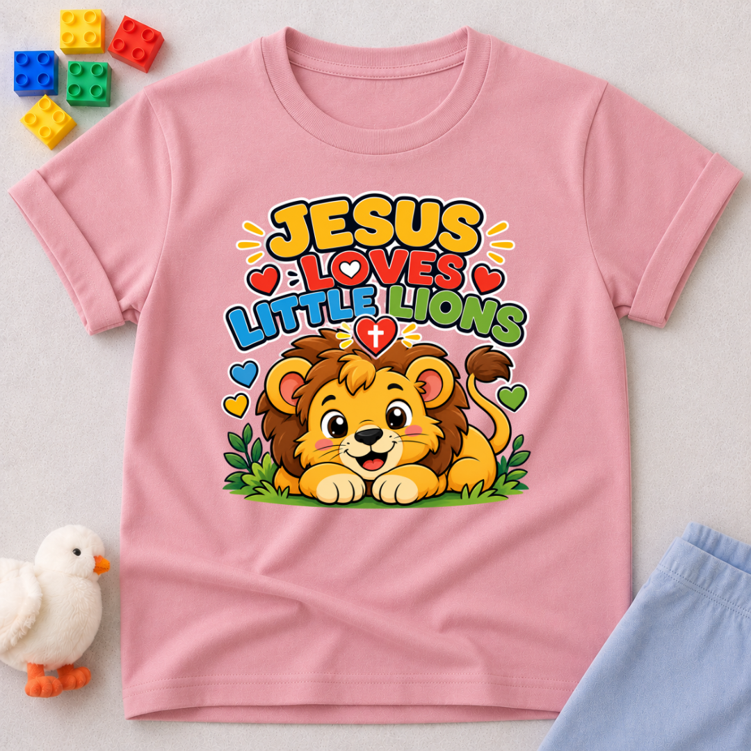 Jesus Loves Little Lions Christian kids shirt in pink featuring a smiling lion with hearts
