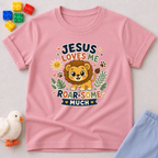 Jesus Loves Me Roar-some Lion Christian kids shirt in Pink featuring a cute lion and encouraging Christian message