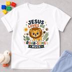 Jesus Loves Me Roar-some Lion Christian kids shirt in White featuring a cute lion and encouraging Christian message