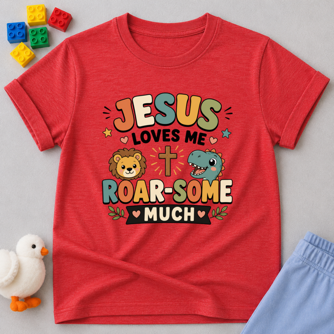 Jesus Loves Me Roar-some Much Christian kids shirt in Pink featuring a cute dinosaur and faith-inspired message
