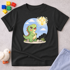 Little Dino Light Shirt Christian kids shirt in Black featuring a dinosaur looking toward a shining cross