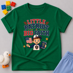 Little Patriot Big Faith Boy Christian kids shirt in green featuring a patriotic child holding a Bible and American flag
