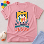 My Family Follows Jesus Christian kids shirt in pink featuring a family beneath a church and cross
