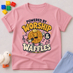 Powered by Worship and Waffles Christian kids shirt in pink featuring a smiling waffle with musical notes

