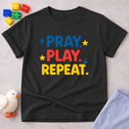 Pray Play Grow Christian kids shirt in Black featuring colorful prayer-inspired typography