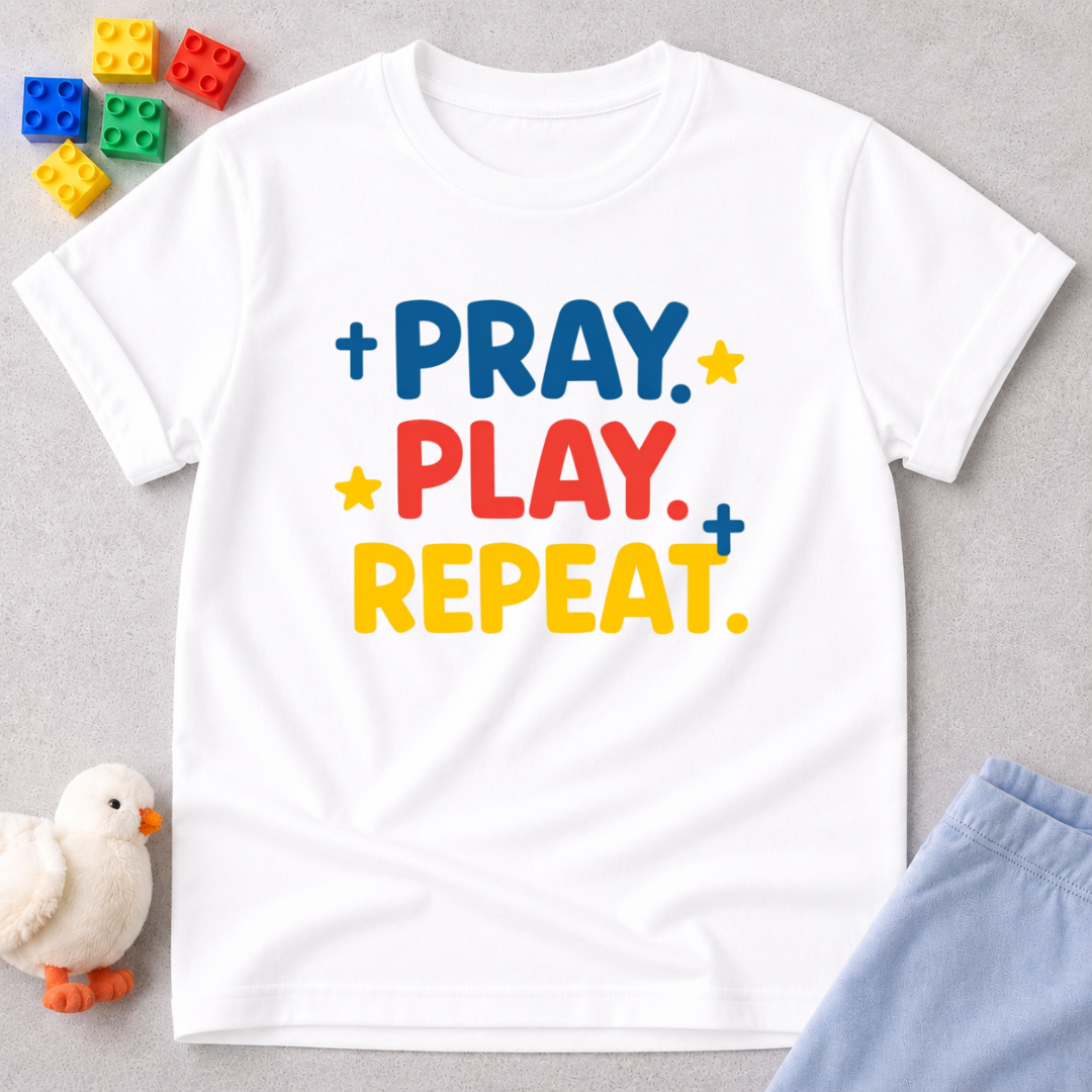 Pray Play Grow Christian kids shirt in White featuring colorful prayer-inspired typography