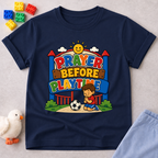 Prayer Before Playtime Christian kids shirt in navy featuring children praying before playing
