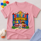 Prayer Before Playtime Christian kids shirt in pink featuring children praying before playing
