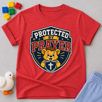 Protected by Prayer Shield Christian kids shirt in red featuring a lion inside a protective shield
