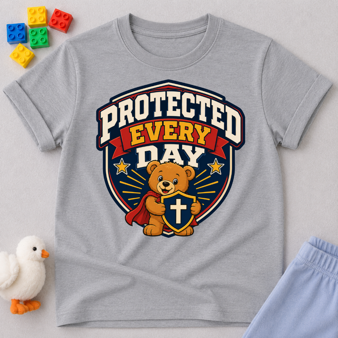 Protected Every Day Christian kids shirt in gray featuring a lion inside a protective shield
