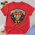 Protected Every Day Christian kids shirt in red featuring a lion inside a protective shield
