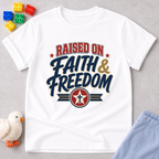 Raised on Faith and Freedom Christian kids shirt in white featuring vintage patriotic typography
