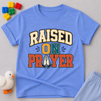 Raised on Prayer Christian kids shirt in blue featuring bold typography and praying hands
