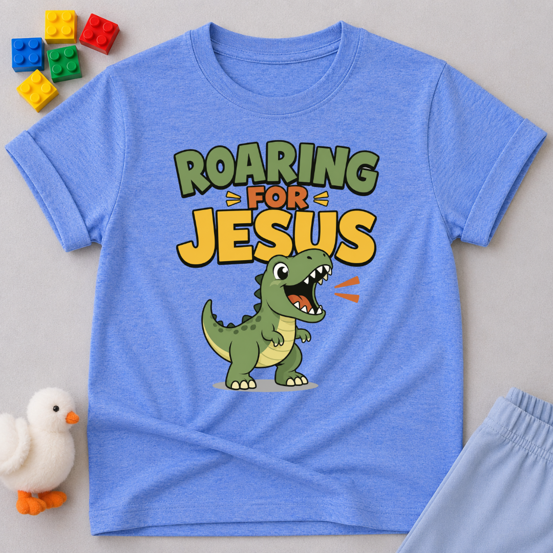 Roaring for Jesus Dino Christian kids shirt in blue featuring a happy roaring dinosaur and Christian message
