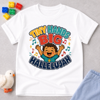 Tiny Hands Big Hallelujah Christian kids shirt in white featuring a joyful child praising God
