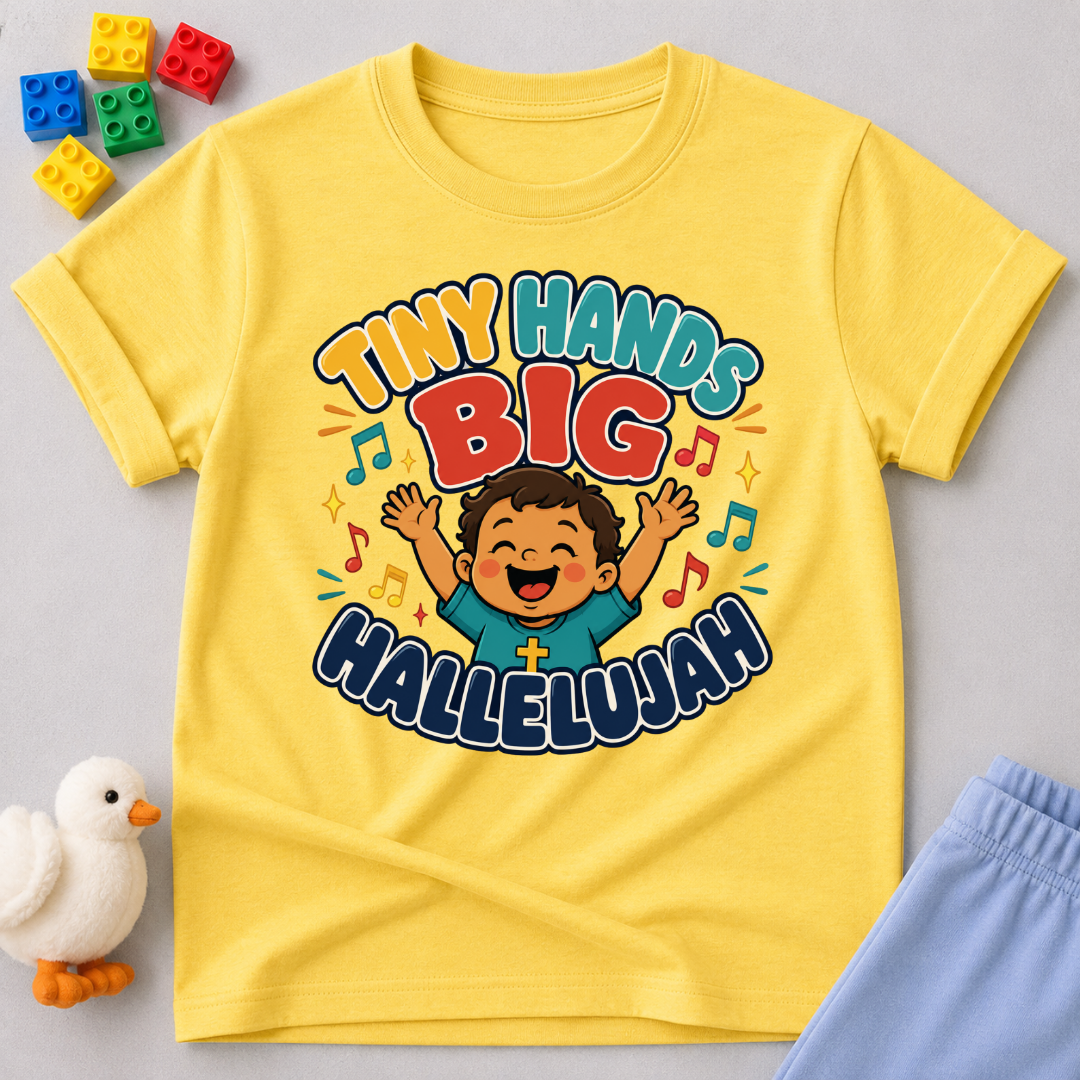 Tiny Hands Big Hallelujah Christian kids shirt in yellow featuring a joyful child praising God
