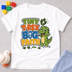 Tiny T-Rex Big Faith Christian kids shirt in white featuring a smiling T-Rex and faith-inspired typography
