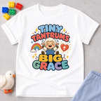 Tiny Tantrums Big Grace Christian kids shirt in white featuring a smiling child and heart

