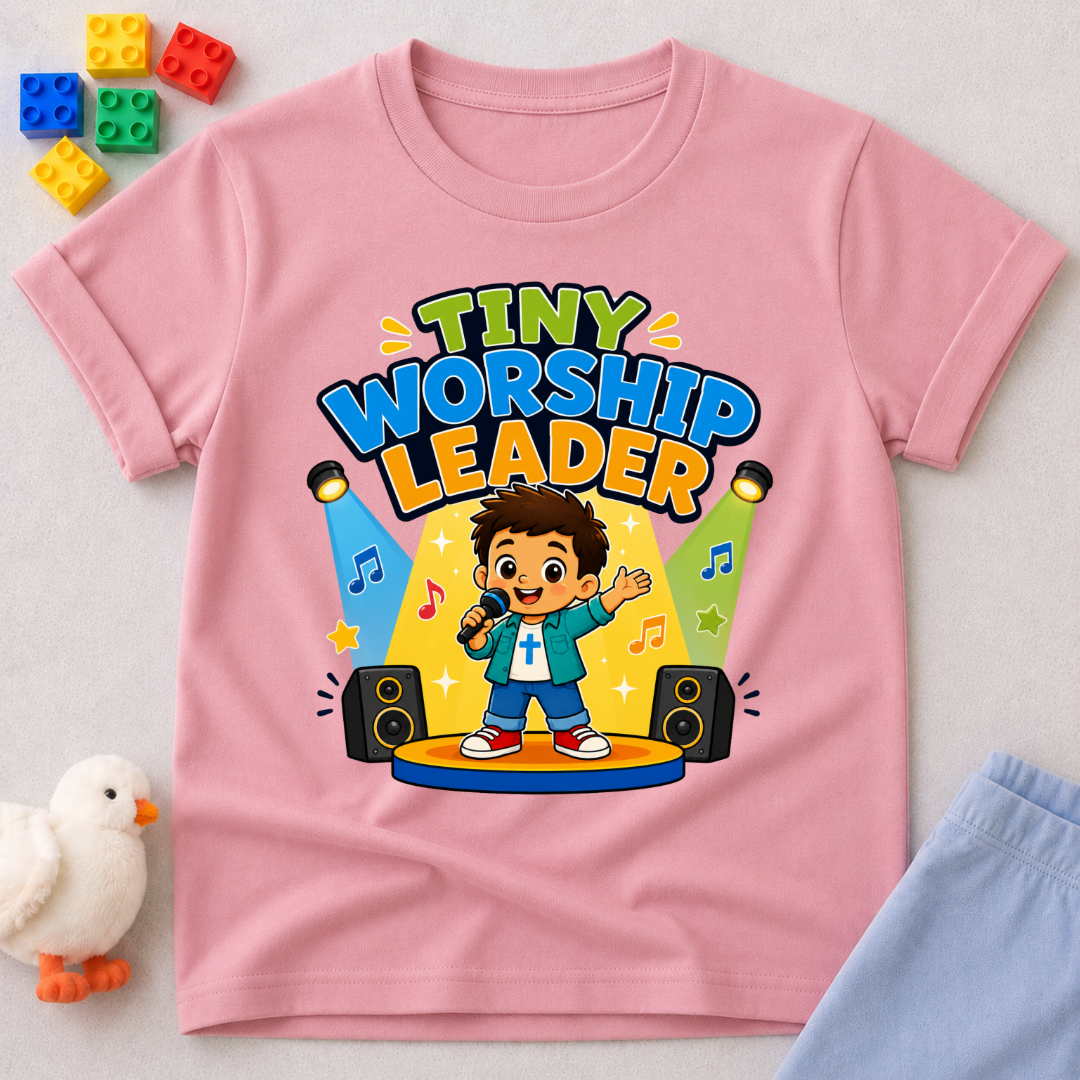 Tiny Worship Leader Christian kids shirt in pink featuring a child singing on stage
