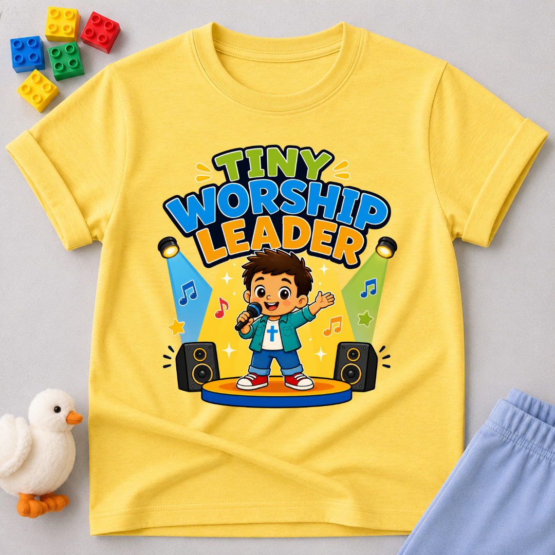 Tiny Worship Leader Christian kids shirt in yellow featuring a child singing on stage

